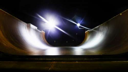 skateboarding halfpipe ramp lights dark