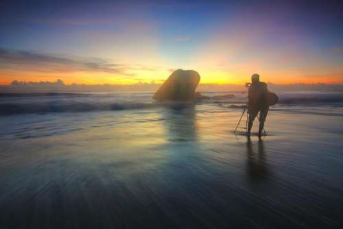 sea water mountain rock sunset