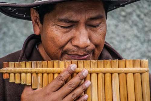 people man hand bamboo flute