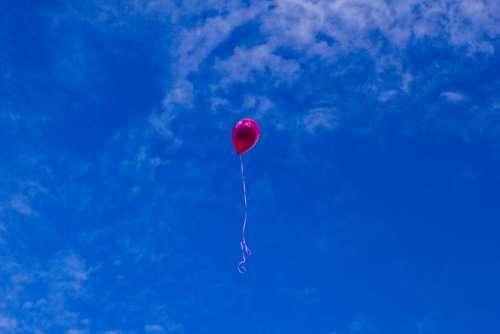 red balloon blue sky sunshine