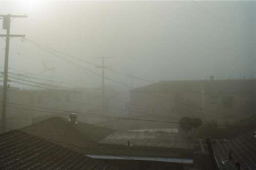 fog sky rooftops buildings houses