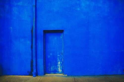blue concrete wall door