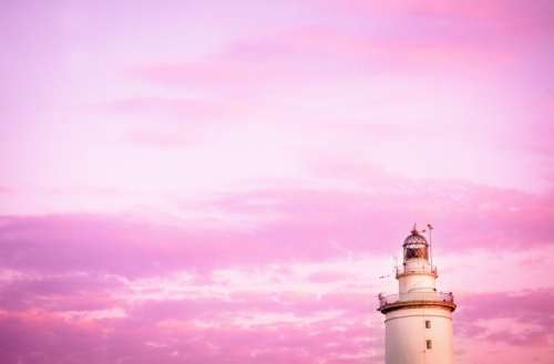 purple sky clouds sunset lighthouse