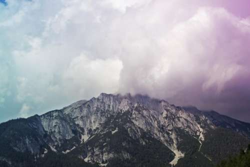 mountain snow winter trees clouds