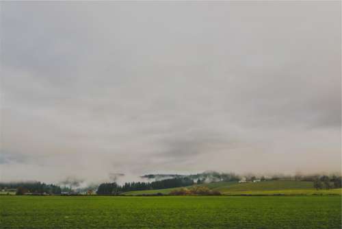 rural countryside fields grass clouds