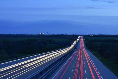 dawn asphalt road lights landscape