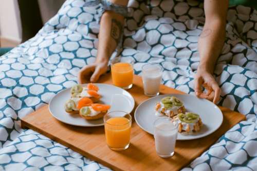 food breakfast in bed juice glass serve