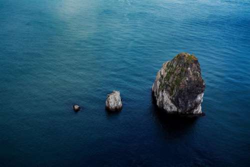 sea ocean blue water rock