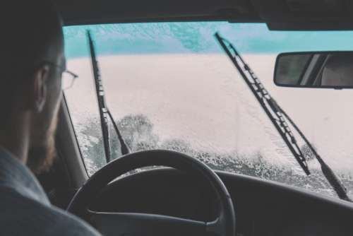 car windshield driving raining windshield wipers