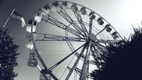 ferris wheel big wheel fairground rides flag