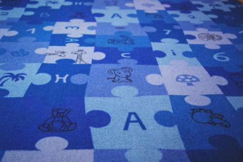 blue puzzle carpet letters numbers
