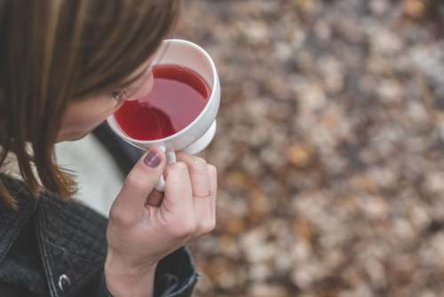 woman tea drink red food