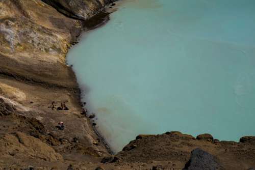 people men women swimming coast