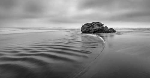 black and white rock sea water ocean