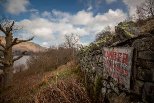 danger sign abandoned building nature