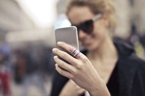 woman selfie phone device technology