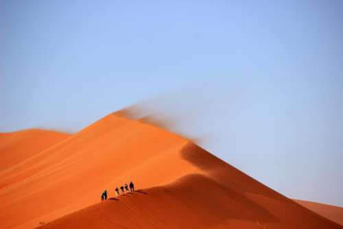 sand dunes desert hills windy hiking