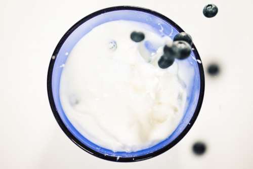 glass milk blueberries fruits healthy
