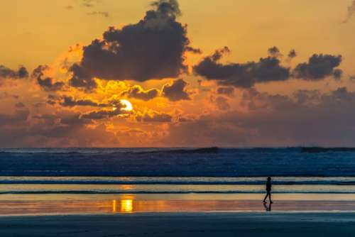 beach sand sunlight sunset sunrise