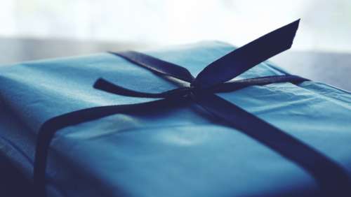 gift present wrapping blue ribbon