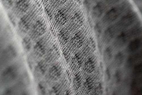 gray fabric macro texture close up