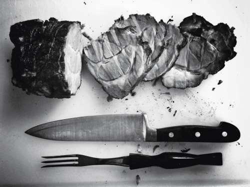roast meat butcher knife fork