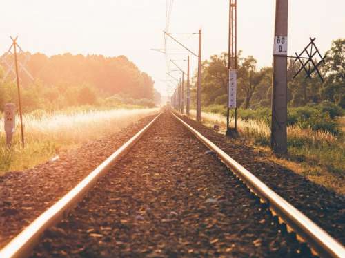 train tracks railroad railway transportation sunset