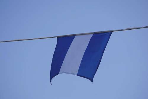 flag blue white cable hung