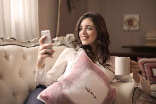 pretty woman smile couch home