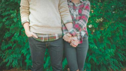 couple holding hands romantic love