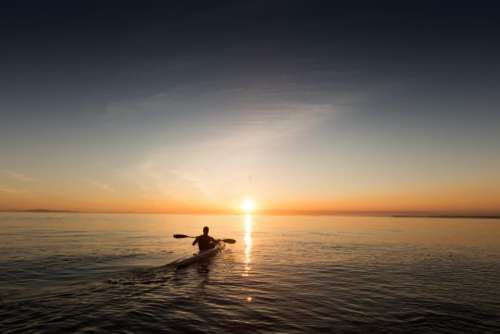kayak lake water sunset horizon