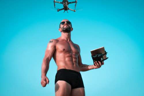 man shorts drone muscles strong