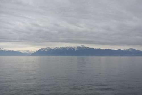 Switzerland landscape mountains water clouds