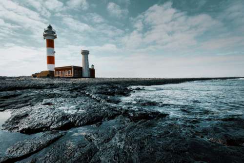 lighthouse sea day ocean water