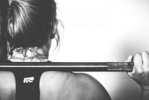 girl woman barbell weights muscles