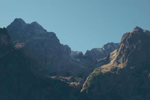 rocks mountain highland blue sky