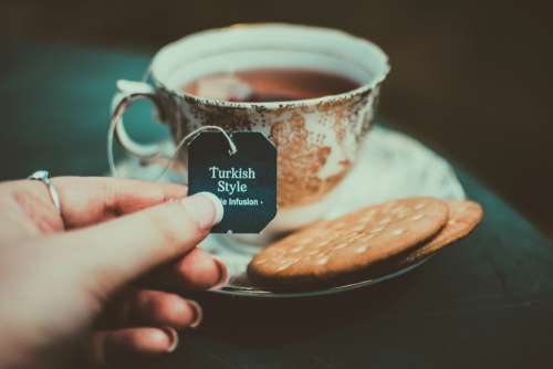 cup turkish tea hand biscuits