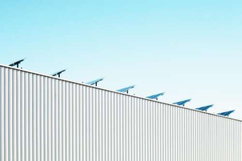 blue sky sunshine solar panels industrial