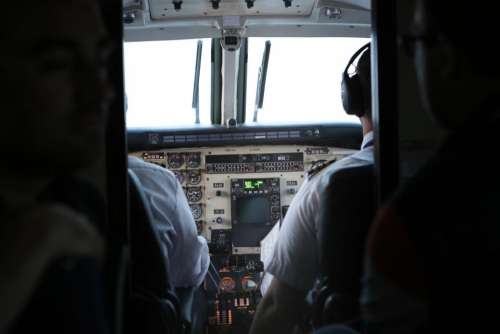 cockpit pilot airplane travel transportation