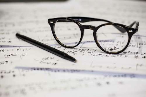 eyeglasses pen music notes audio
