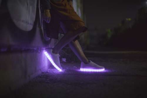 glowing sneakers night dark purple