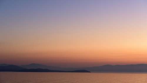 ocean pastel sunset mountains landscape