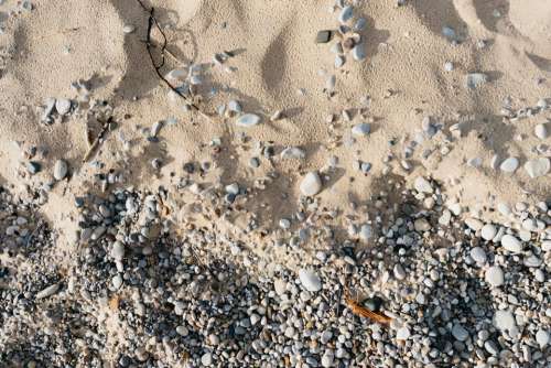 rocks pebbles sand beach