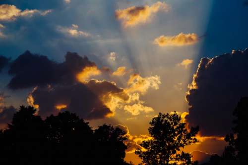 sun rays sunset dusk clouds sky
