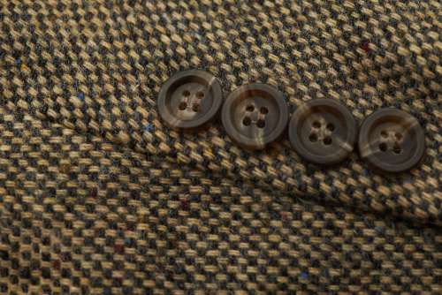 tweed suit buttons coat closeup