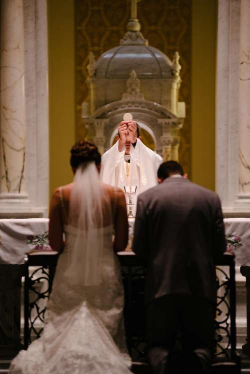 wedding mass priest bride groom