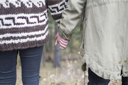 couple love holding hands people romance