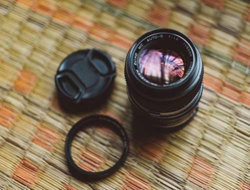 camera lens reflection placemat black