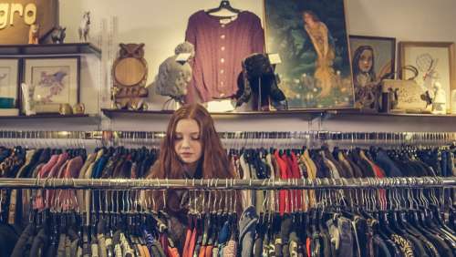 woman shopping clothes store browse