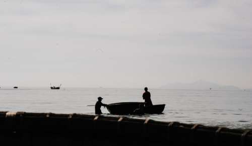 fishing boat man men shadow